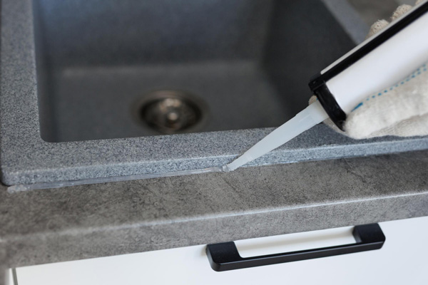 Caulking sink